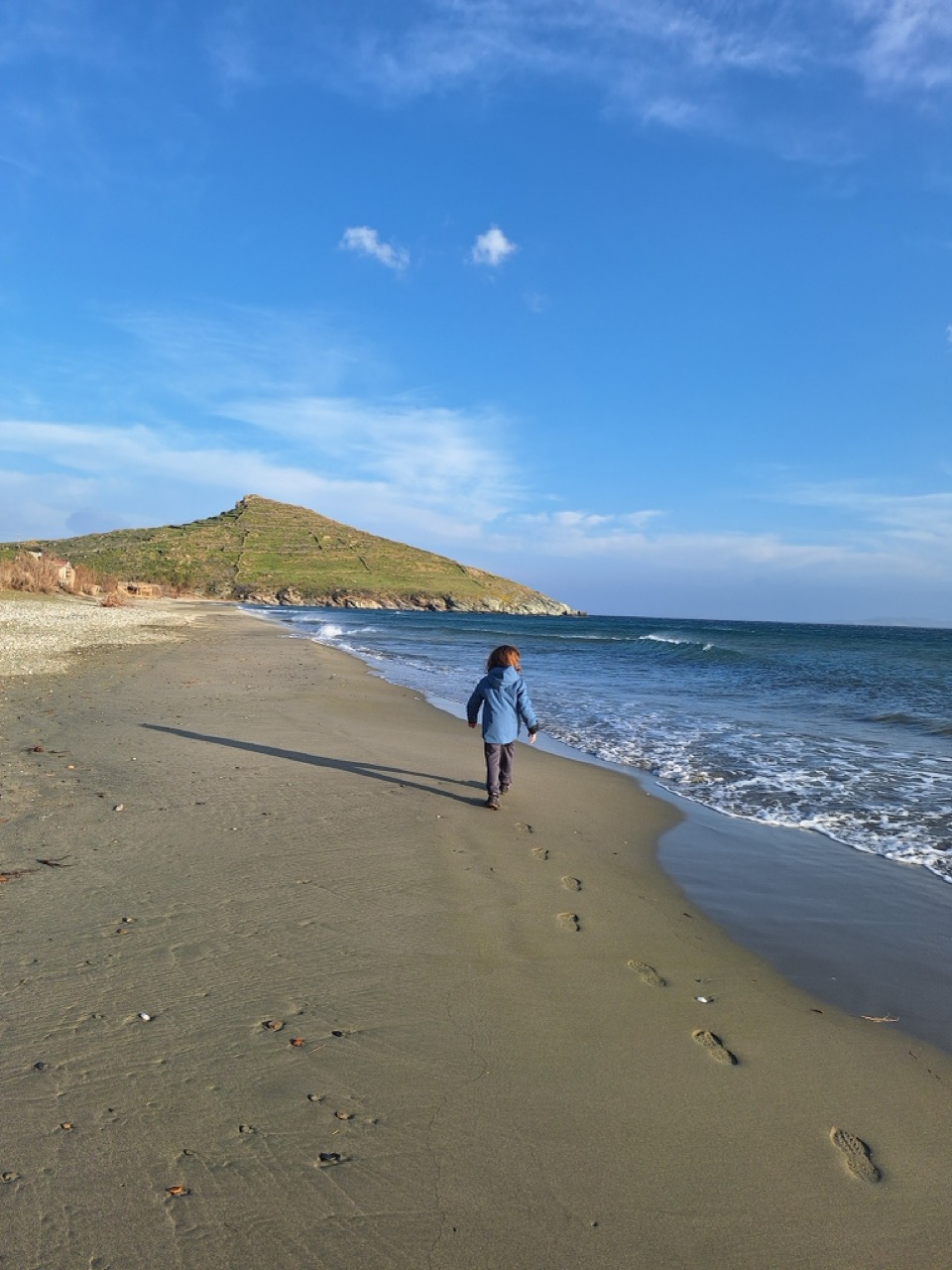Walking along Tinos beach